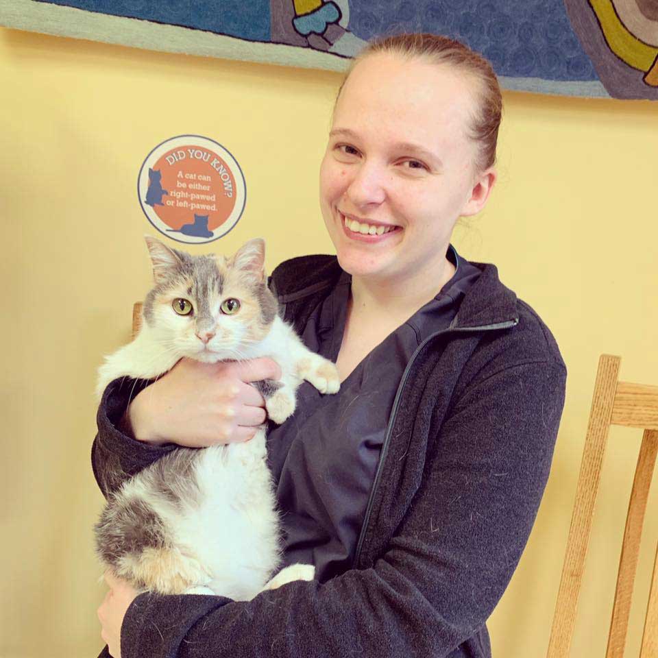 A veterinary technician with one of our furry patients